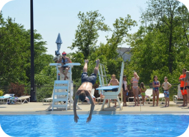 Diving into pool