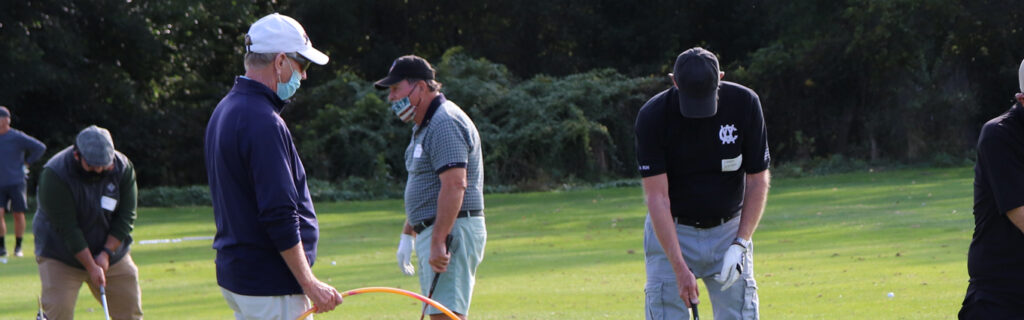 Veterans playing golf