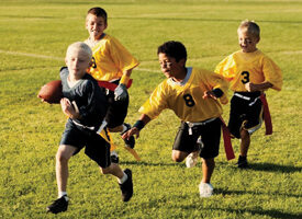 photo of boys playing flag football