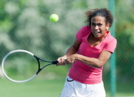 woman playing tennis